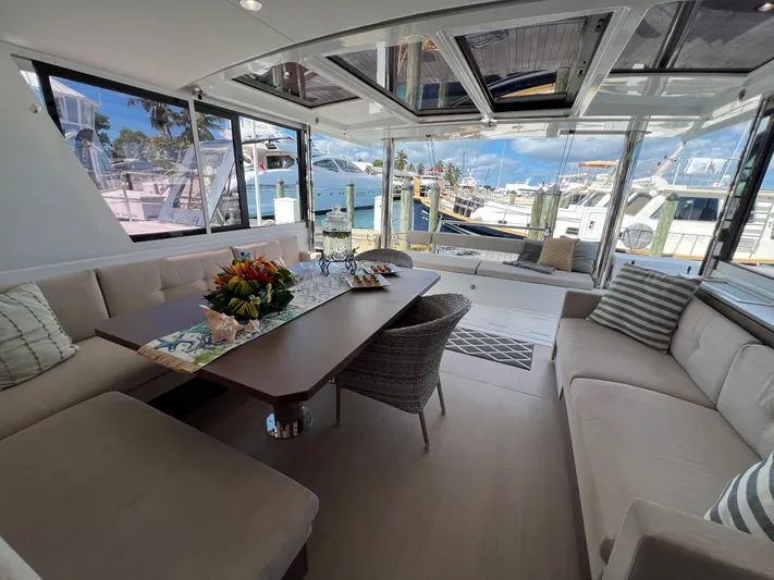  Yacht Photos Pics Luxurious interior of 2020 Bali 4.8 yacht with spacious seating and elegant decor.
