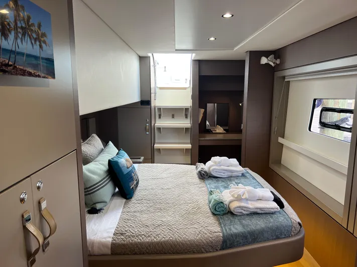  Yacht Photos Pics Luxurious bedroom interior of 2020 Bali 4.8 yacht with modern decor and natural light.