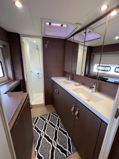  Yacht Photos Pics Modern bathroom in 2020 Bali 4.8 yacht with dual sinks and shower.
