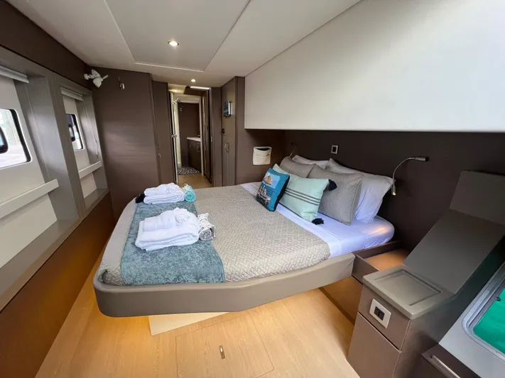  Yacht Photos Pics Luxurious bedroom interior of 2020 Bali 4.8 yacht with modern design and cozy bedding.
