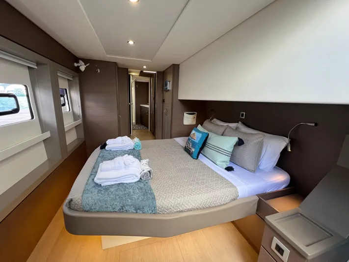  Yacht Photos Pics Luxurious bedroom interior of 2020 Bali 4.8 yacht with modern design and cozy bedding.