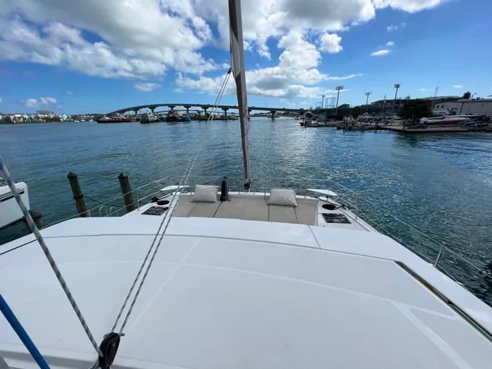  Yacht Photos Pics Bali 4.8 catamaran on water with bridge and cloudy sky in background, 2020 model.