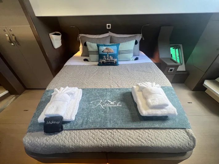  Yacht Photos Pics Luxurious bedroom interior on a 2020 Bali 4.8 yacht with elegant bedding and decor.