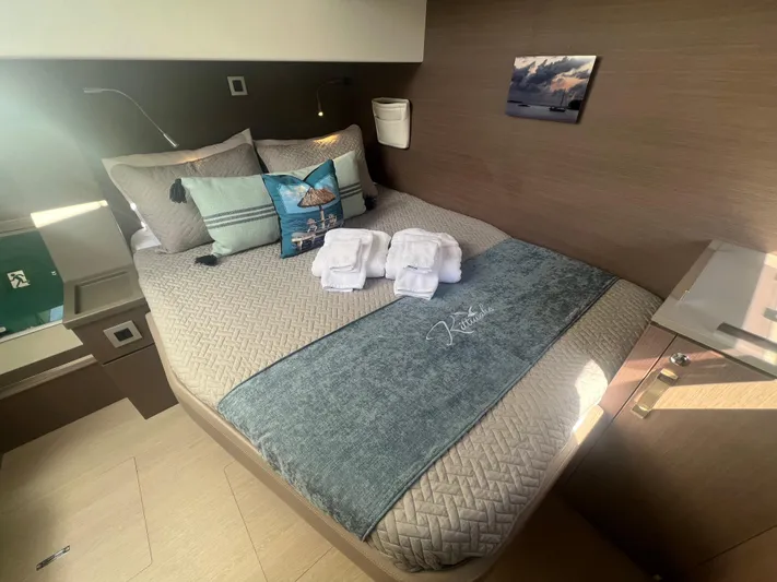  Yacht Photos Pics Luxurious bedroom interior of 2020 Bali 4.8 yacht with neatly arranged bed and pillows.