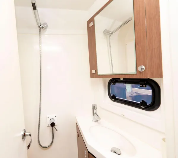  Yacht Photos Pics Modern bathroom in 2020 Bali 4.8 yacht with shower, sink, and mirror cabinet.