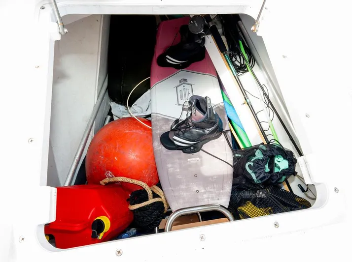  Yacht Photos Pics Storage compartment on a 2020 Bali 4.8 boat with water sports equipment.