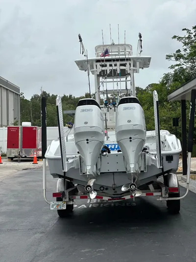  Yacht Photos Pics Rear view of a 2023 Young 27 boat with dual 300 horsepower engines.