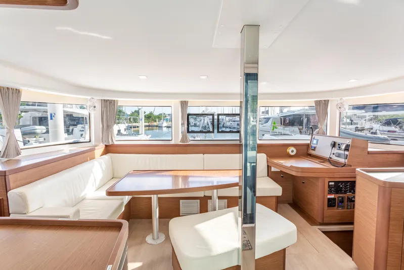 Arctic Fantasy II Yacht Photos Pics Luxurious interior of 2020 Lagoon 42 catamaran with spacious seating and modern navigation equipment.