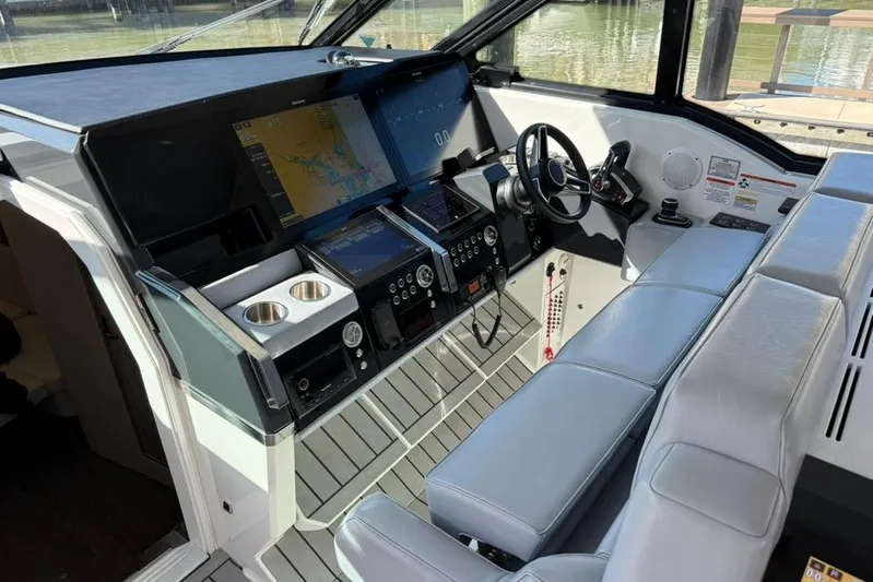  Yacht Photos Pics 2022 Formula 500 Super Sport Crossover helm with advanced navigation and control systems.