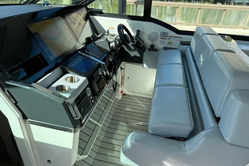  Yacht Photos Pics Interior of 2022 Formula 500 Super Sport Crossover boat with modern dashboard and seating.