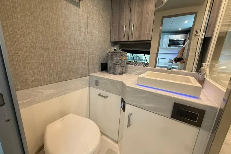  Yacht Photos Pics Modern bathroom in 2022 Formula 500 Super Sport Crossover with sleek sink and toilet.