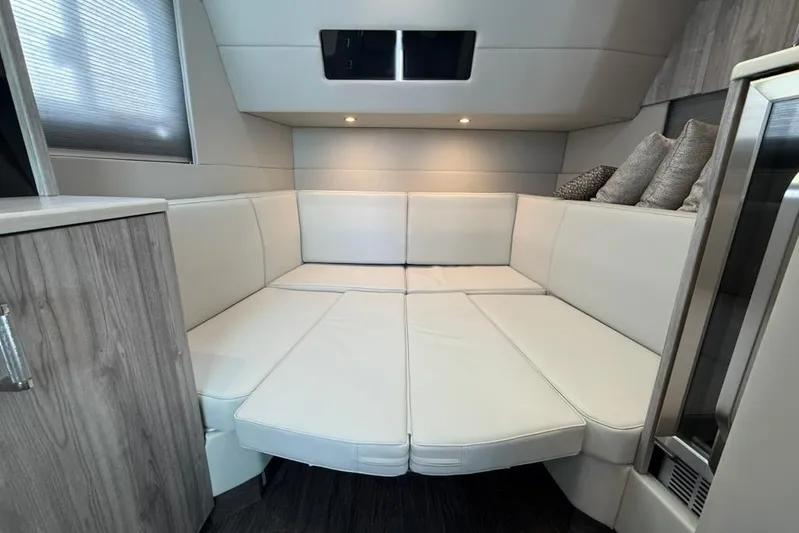  Yacht Photos Pics Luxurious interior of 2022 Formula 500 Super Sport Crossover with white leather seating.