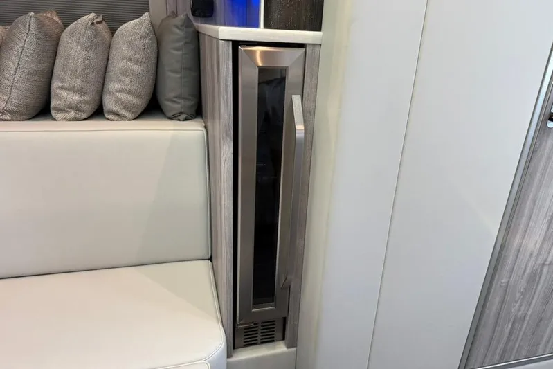  Yacht Photos Pics Interior of 2022 Formula 500 Super Sport Crossover with modern seating and sleek cabinetry.