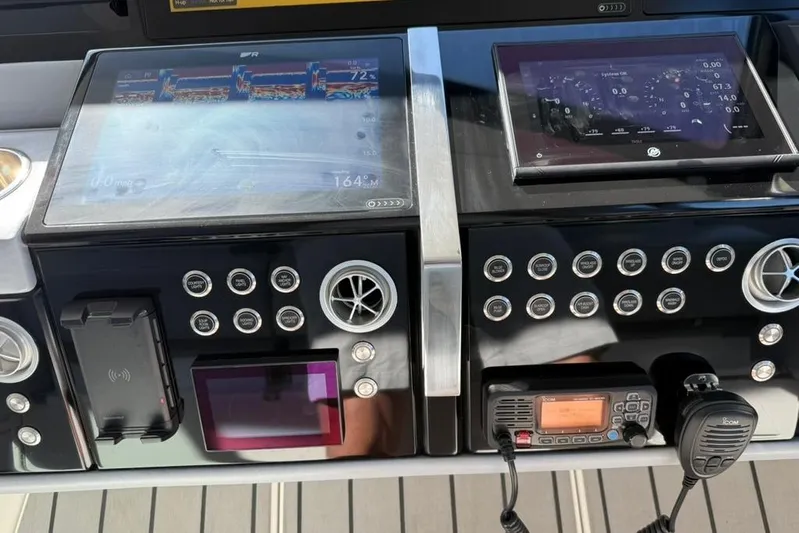  Yacht Photos Pics Control panel of a 2022 Formula 500 Super Sport Crossover with digital displays and controls.