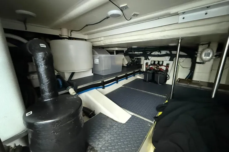  Yacht Photos Pics 2022 Formula 500 Super Sport Crossover engine room with equipment and storage.