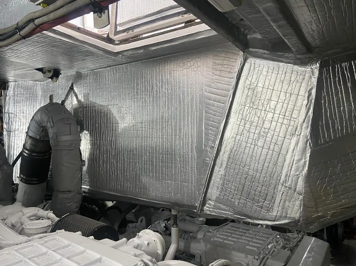 August Moon Yacht Photos Pics Engine room of 2000 Sunseeker Predator 80 yacht with insulated walls and machinery.