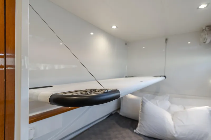 Flash Yacht Photos Pics Interior of 2017 HH Catamarans HH66 with surfboard storage and cushions.