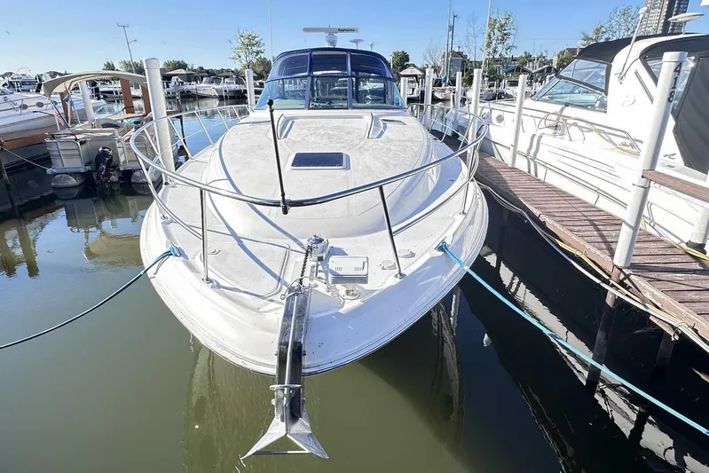  Yacht Photos Pics 2000 Sea Ray 410 Sundancer yacht docked at marina, front view.