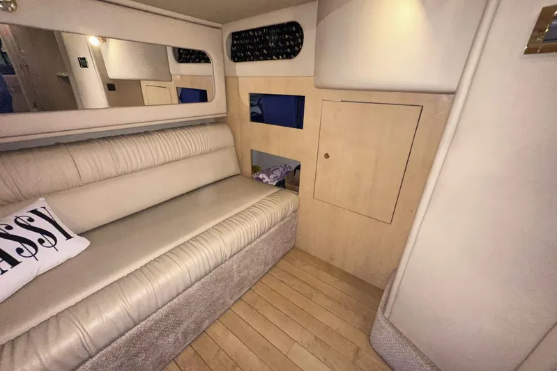  Yacht Photos Pics Interior of 2000 Sea Ray 410 Sundancer with beige seating and wooden accents.