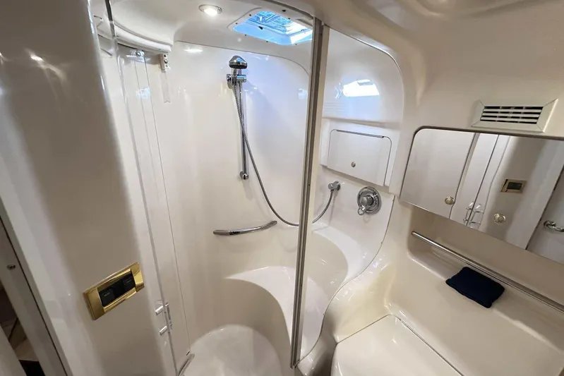  Yacht Photos Pics Luxurious bathroom in 2000 Sea Ray 410 Sundancer yacht with shower and sleek design.