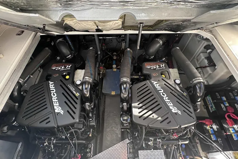  Yacht Photos Pics Engine compartment of a 2000 Sea Ray 410 Sundancer with twin Mercury engines.