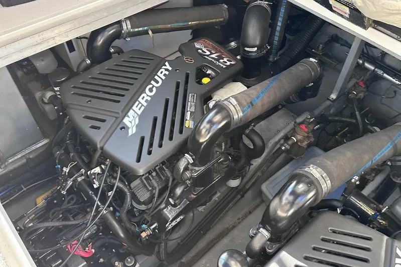  Yacht Photos Pics Engine compartment of a 2000 Sea Ray 410 Sundancer with Mercury engine components.