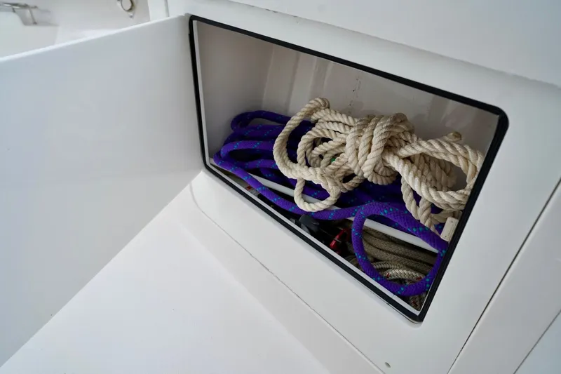  Yacht Photos Pics Storage compartment with ropes on a 2015 Southport 29 FE boat.