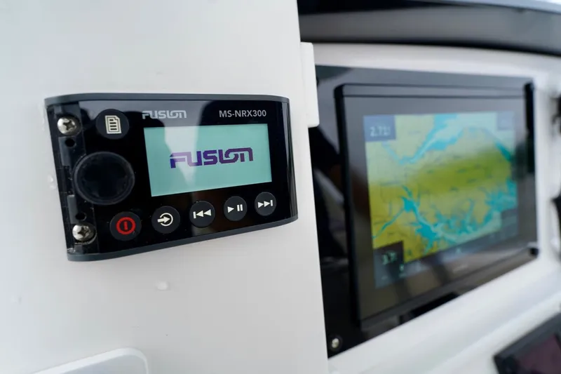  Yacht Photos Pics Fusion MS-NRX300 marine stereo and navigation display on 2015 Southport 29 FE boat.