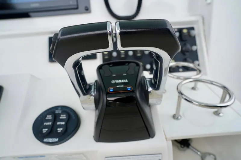 Yacht Photos Pics Control panel of a 2015 Southport 29 FE boat with Yamaha throttle levers.