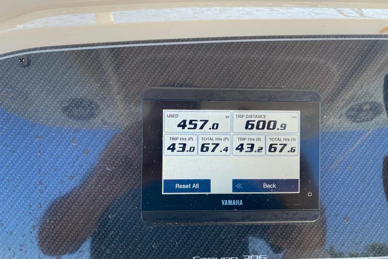  Yacht Photos Pics Dashboard of 2024 Grady-White Canyon 306 showing trip data and fuel usage.