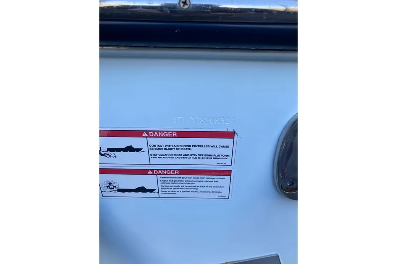  Yacht Photos Pics 2024 Grady-White Canyon 306 boat warning labels and hull identification number.