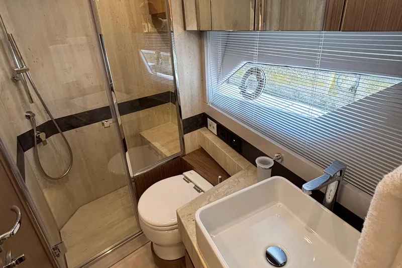  Yacht Photos Pics Luxurious bathroom in 2025 Filippetti S55 yacht with modern fixtures and elegant design.