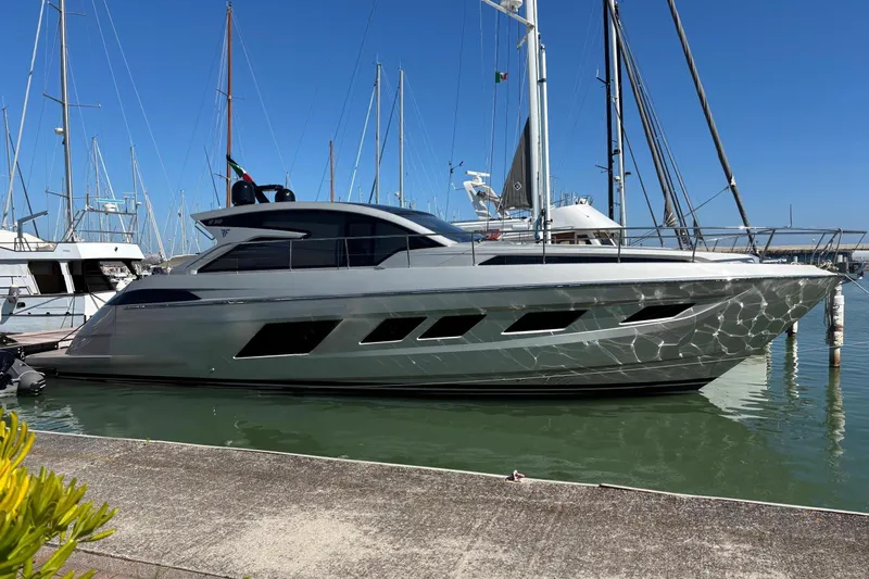  Yacht Photos Pics Luxury 2025 Filippetti S55 yacht docked in marina under clear blue sky.