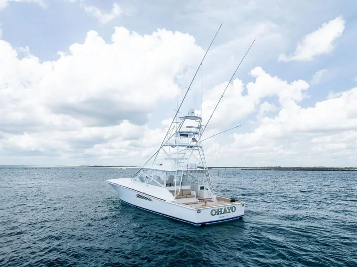 Ohayo Yacht Photos Pics 2010 Viking 52 Open yacht on open sea under cloudy sky.