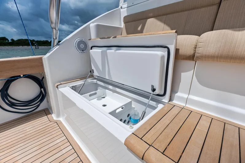 Ohayo Yacht Photos Pics Viking 52 Open 2010 boat with open storage compartment on deck.