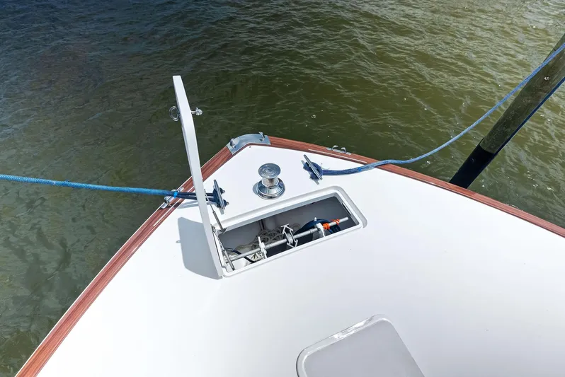 Ohayo Yacht Photos Pics Bow of 2010 Viking 52 Open yacht with anchor compartment and mooring lines.