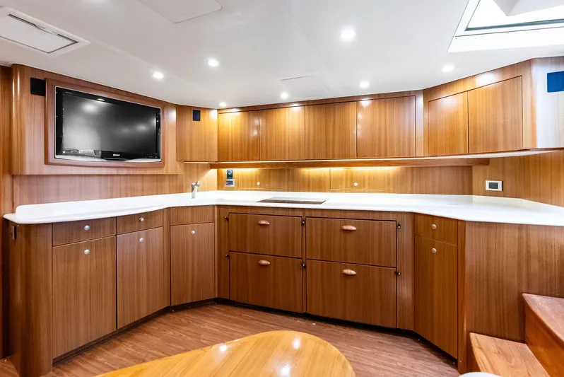 Ohayo Yacht Photos Pics Luxurious interior of 2010 Viking 52 Open yacht with modern wood cabinetry and sleek design.