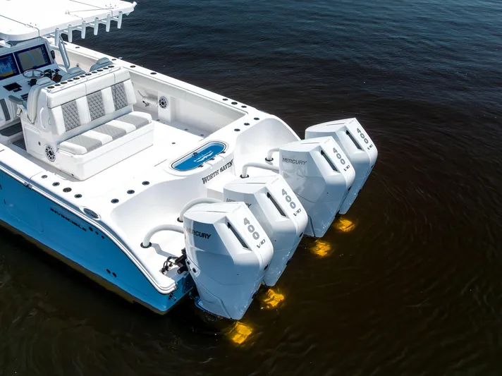  Yacht Photos Pics 2024 Invincible 37 Catamaran with four Mercury engines, featuring a spacious deck and modern controls.