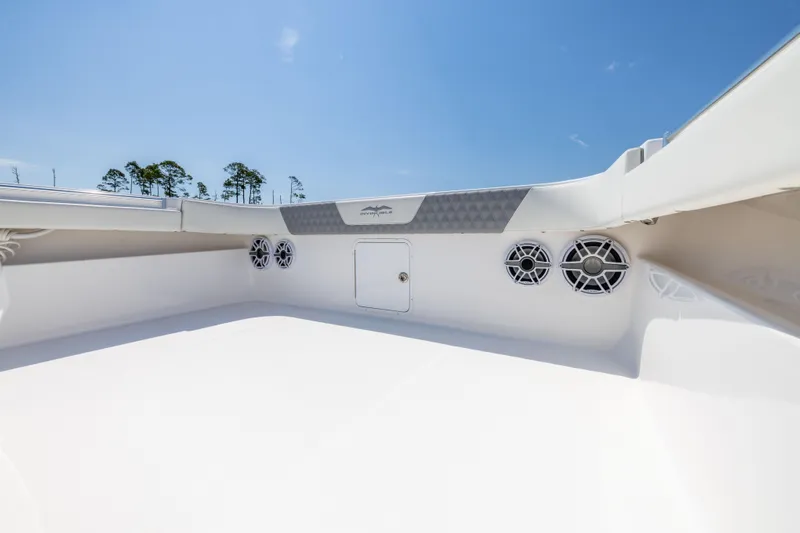  Yacht Photos Pics 2024 Invincible 37 Catamaran deck with speakers and storage compartment.