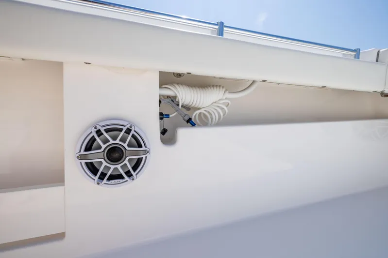  Yacht Photos Pics 2024 Invincible 37 Catamaran speaker and coiled hose detail.