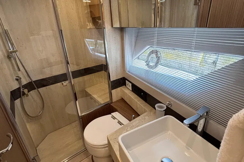  Yacht Photos Pics Luxurious bathroom in 2025 Filippetti S55 yacht with modern fixtures and elegant design.