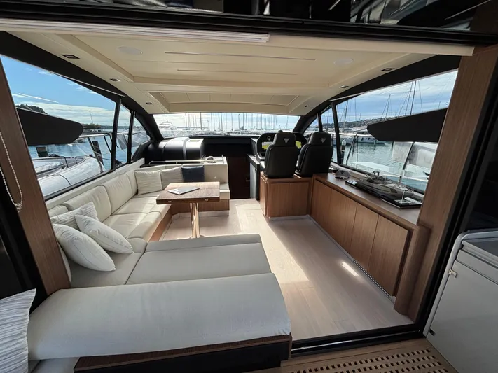  Yacht Photos Pics Luxurious interior of 2025 Filippetti S55 yacht with elegant seating and panoramic views.