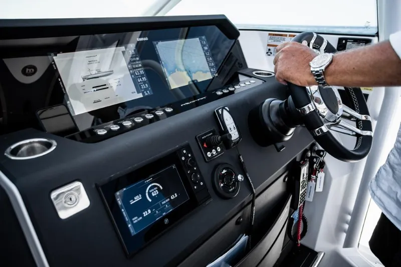  Yacht Photos Pics 2025 Axopar 37 Sun Top BRABUS Trim dashboard with advanced navigation controls.