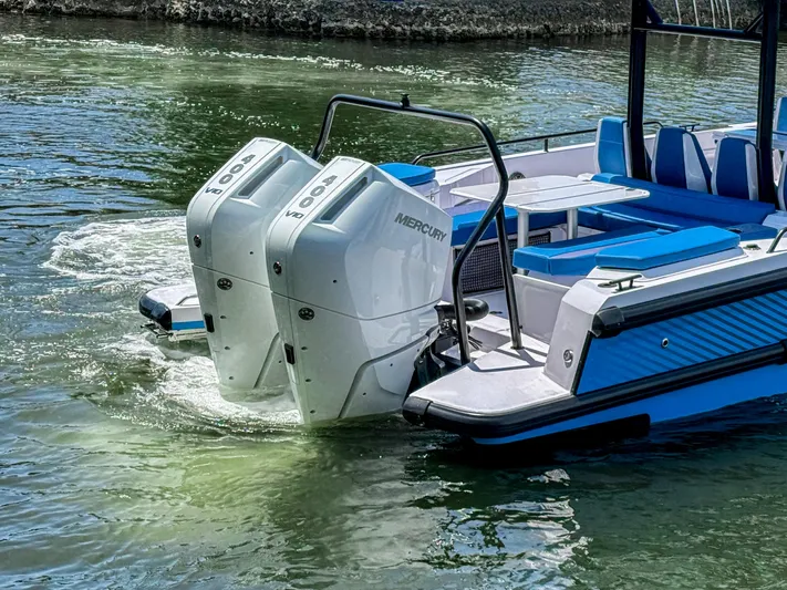  Yacht Photos Pics 2025 Axopar 37 Sun Top BRABUS Trim with dual Mercury 400 engines on water.