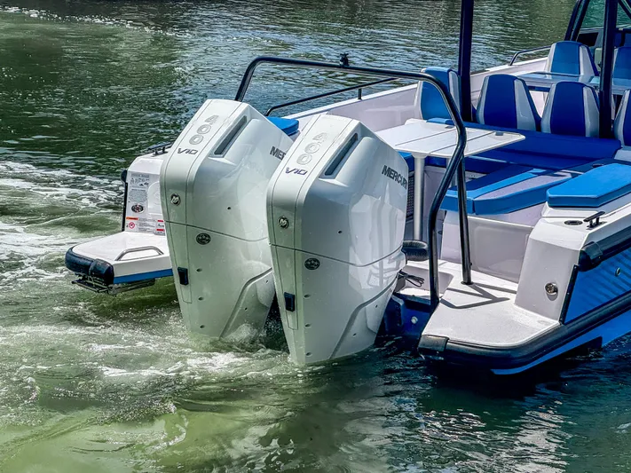  Yacht Photos Pics 2025 Axopar 37 Sun Top BRABUS Trim with dual Mercury V10 engines on water.