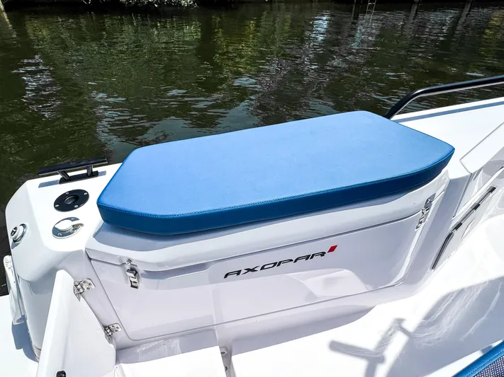  Yacht Photos Pics 2025 Axopar 37 Sun Top BRABUS Trim boat with blue cushioned seating.