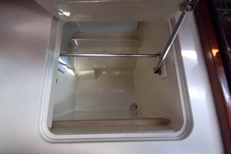 We Reach Yacht Photos Pics Open storage compartment on 2011 Dufour 425 Grand Large yacht.