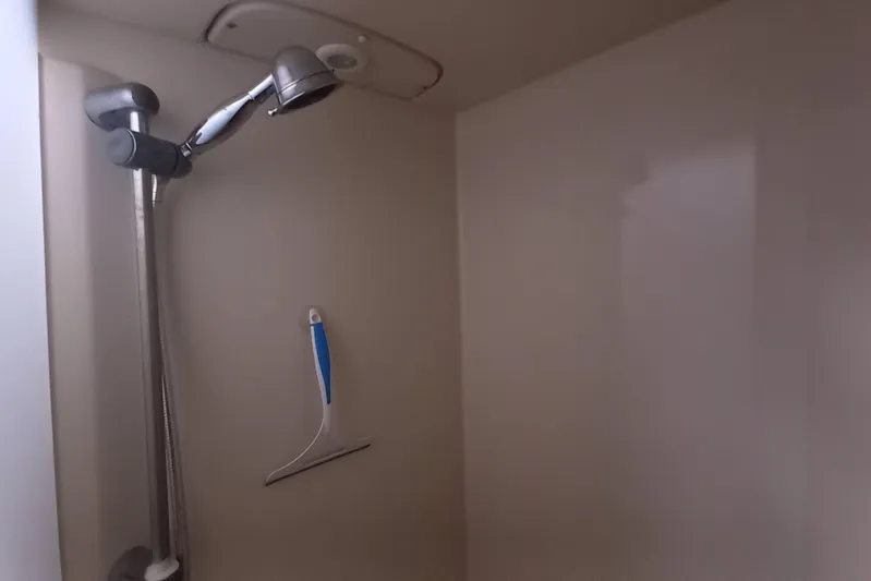 We Reach Yacht Photos Pics Shower area in 2011 Dufour 425 Grand Large yacht with squeegee.