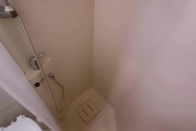 We Reach Yacht Photos Pics Shower area in 2011 Dufour 425 Grand Large yacht, featuring compact design and fixtures.