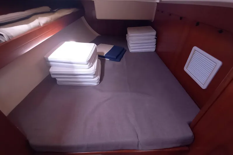 We Reach Yacht Photos Pics Cabin interior of 2011 Dufour 425 Grand Large yacht with stacked cushions.